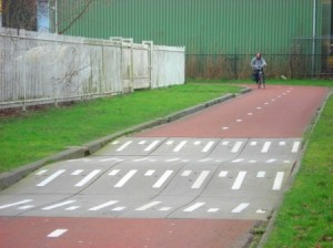 2-way off-road bike path and speed bumps in Groningen, Netherlands. Image Credit: Zachary Shahan / Bikocity